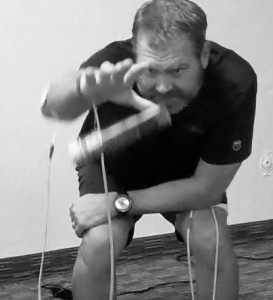 Dr Jeff Banas doing exercises with the direct current Phoenix Wavefrom